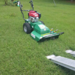 Our rental brush hog. We thought it would be able to do more, but underestimated how thick the brush was.