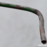 Rusted Metal Fuel Line From the Side