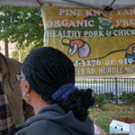 My mom learning about heirloom Puerto Rican sweet potatoes. This young man has been farming for generations! pine knot farms