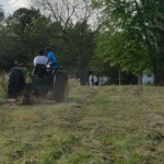 Ju riding with Mr. Green Thumb again